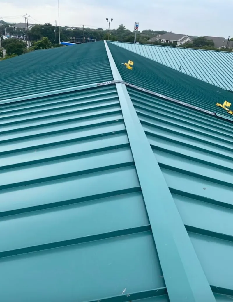 Green commercial metal roof ridge and valley for Metal Roof Repair in Tisbury